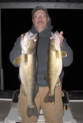 Al with a 5 & 8.5 Walleye rouging at night in December